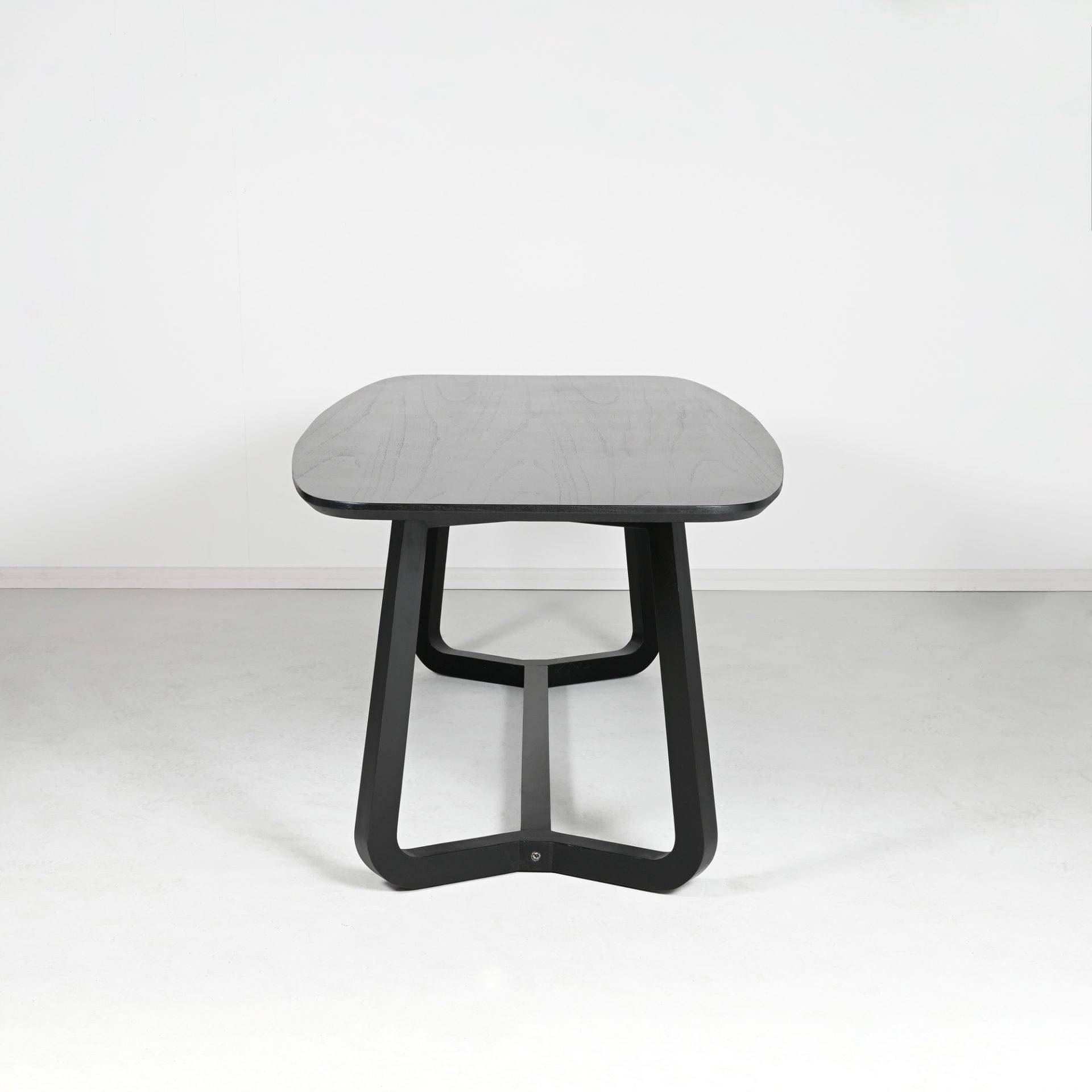 Black wood oval dining table