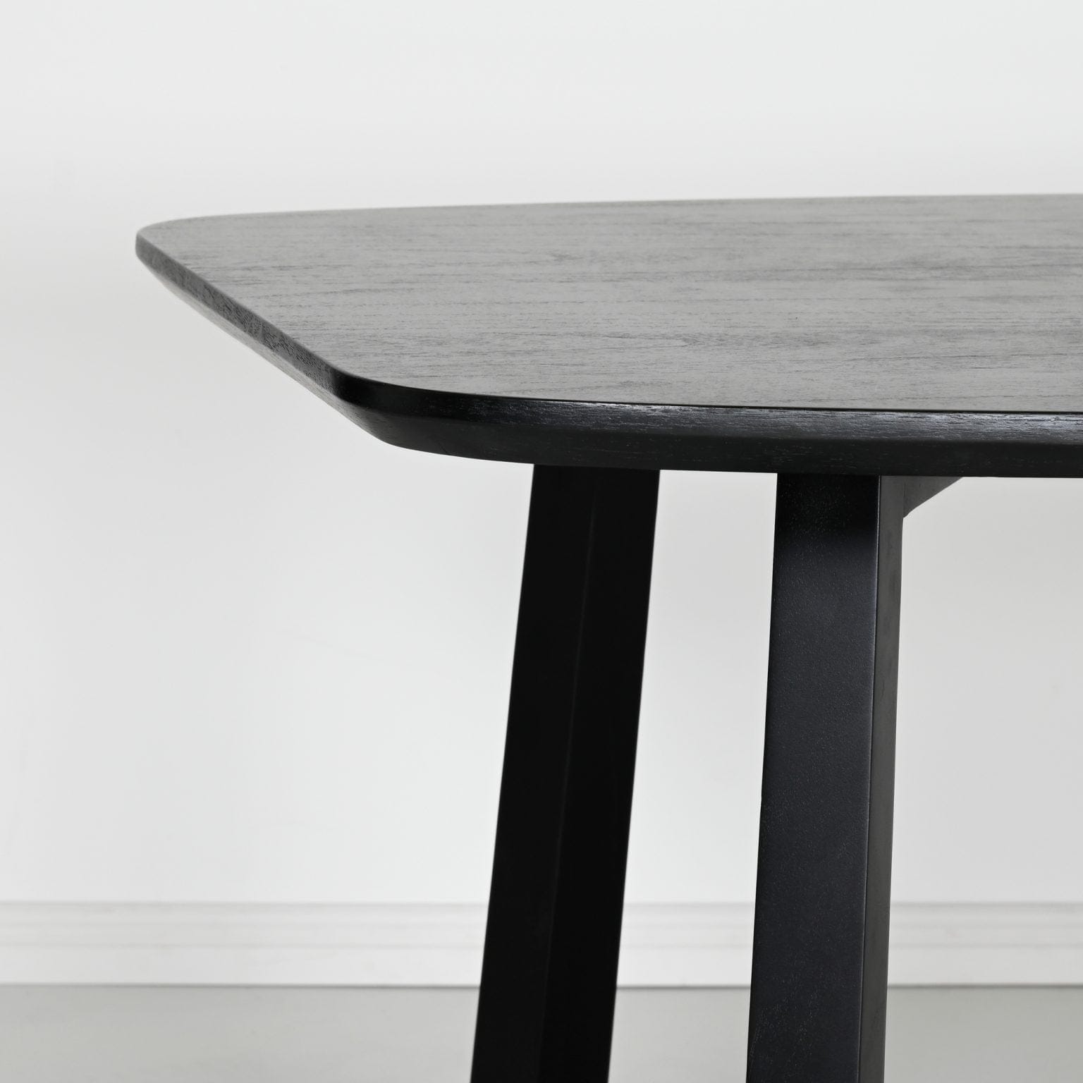 Black wood oval dining table