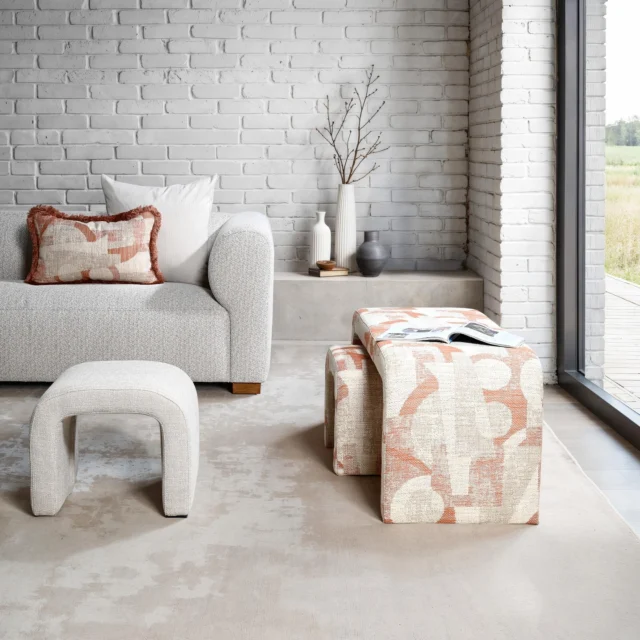 The Lyon Arched Ottoman is a sculptural, versatile accent piece that blends soft curves with bold simplicity. Its distinctive arched profile gives it a refined architectural character, while the generously upholstered form brings softness and tactility to any space. Available in both small and large sizes, each piece is designed to function beautifully on its own or to nest together as a striking duo—ideal for dynamic spaces that benefit from flexibility in layout and scale.